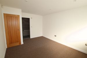 Bedroom One- click for photo gallery